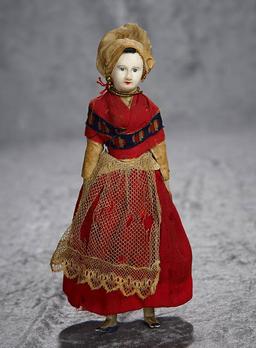 8" Early French paper mache doll in original costume. $300/500