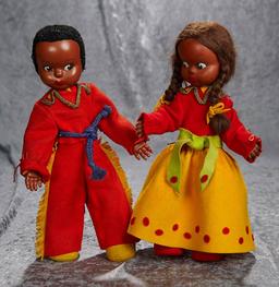 Pair of 14" French celluloid dolls by Urika in original costumes. $400/500