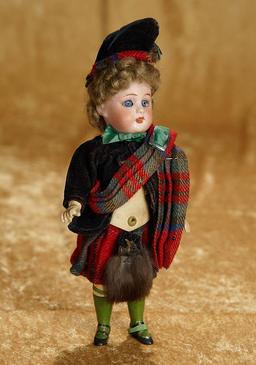 8" German bisque child by S&H, wonderful original Scottish costume, painted stockings. $300/500