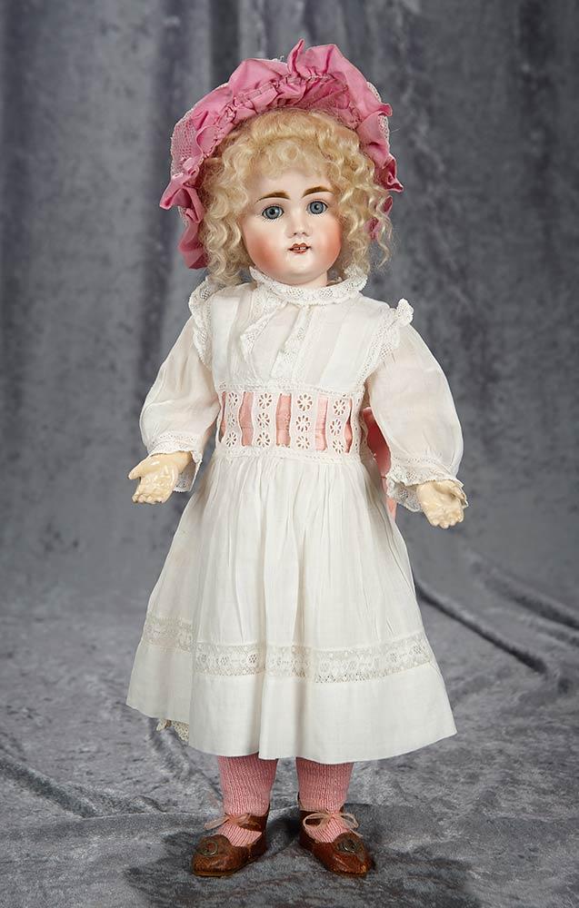 17" German bisque doll by Kestner with rare square cut teeth and pretty antique costume. $900/1200