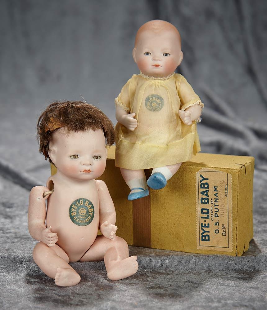 5 1/2" & 6" Two German all-bisque Bye-Lo Babies with original paper labels, one with box. $600/800