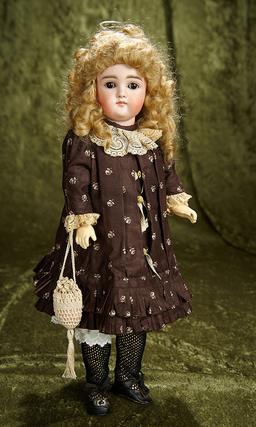 15" German bisque closed mouth child doll by Kestner with original body. $800/1000