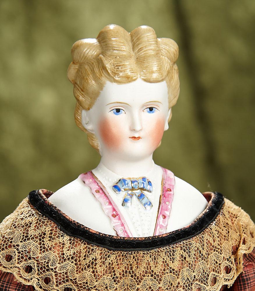 17" German bisque lady with sculpted rare brown hair and decorated bodice. $800/1000