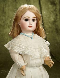 19" French bisque brown-eyed bebe by Emile Jumeau with original signed body. $2800/3200