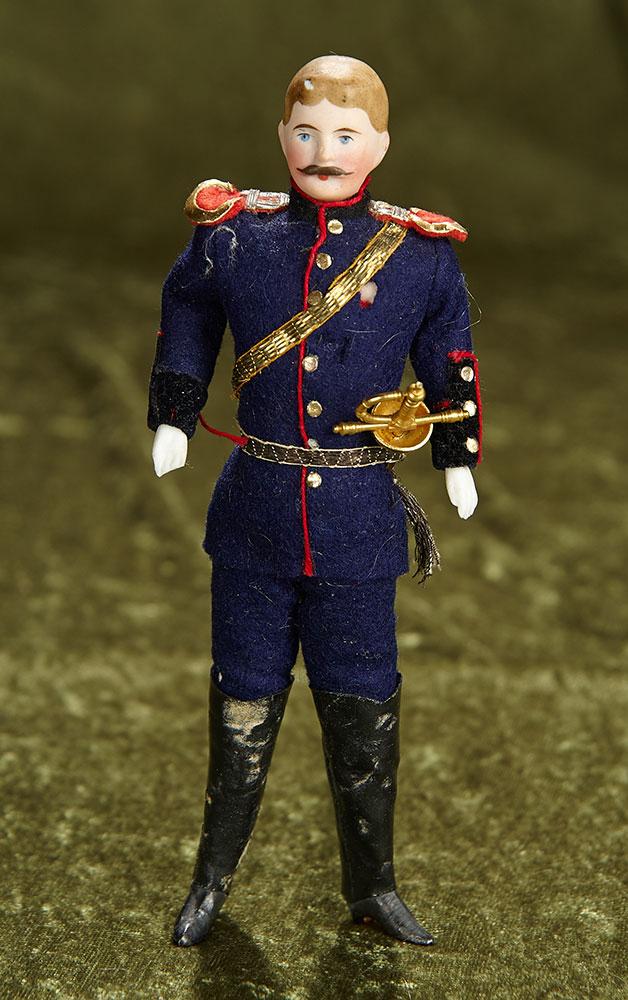 7" German bisque dollhouse soldier in original uniform with sword. $400/500