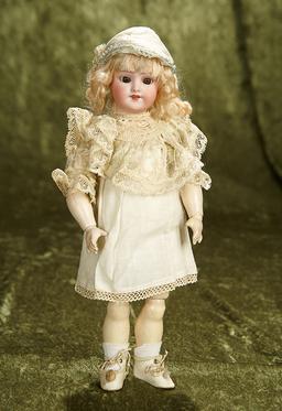 12" German bisque child, "Globe Baby", by Simon and Halbig. $400/500