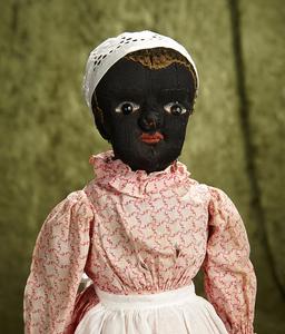 American black cloth folk doll in the Beecher manner with shoe-button eyes. $400/500