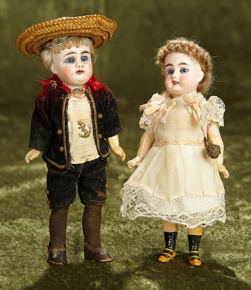 7" & 8" Two Sonneberg bisque brother and sister child dolls by Gebruder Kuhnlenz. $500/700