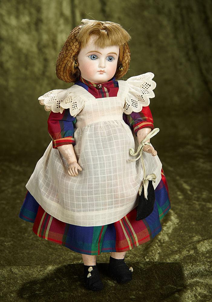 13" Sonneberg bisque closed mouth child with original costume. $600/800