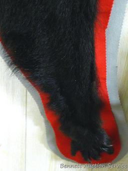 Nice black bear rug measures 6'-2" from head to toe.