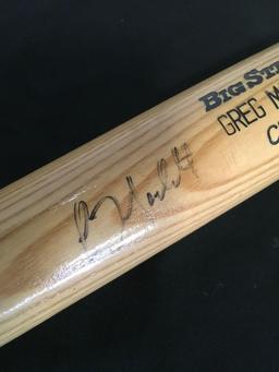 Big Stick Autographed bat by Greg Maddux