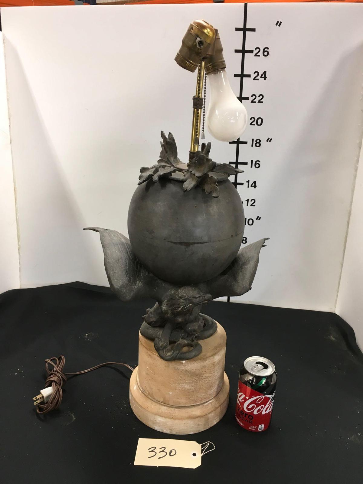 Vintage lamp. Metal eagle with broken wing