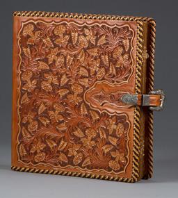 Fantastic carved leather Binder by noted artist, the late Bob Dellis, (1928-2002), 12" x 10 1/2", fl