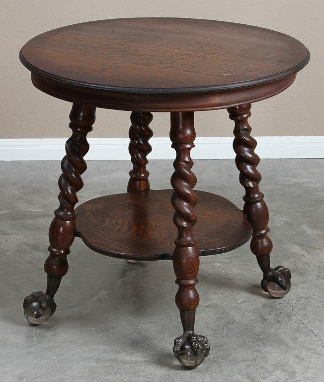 Fancy antique, quarter sawn oak, round Lamp Table, circa 1910, with large Tiffany style, glass ball