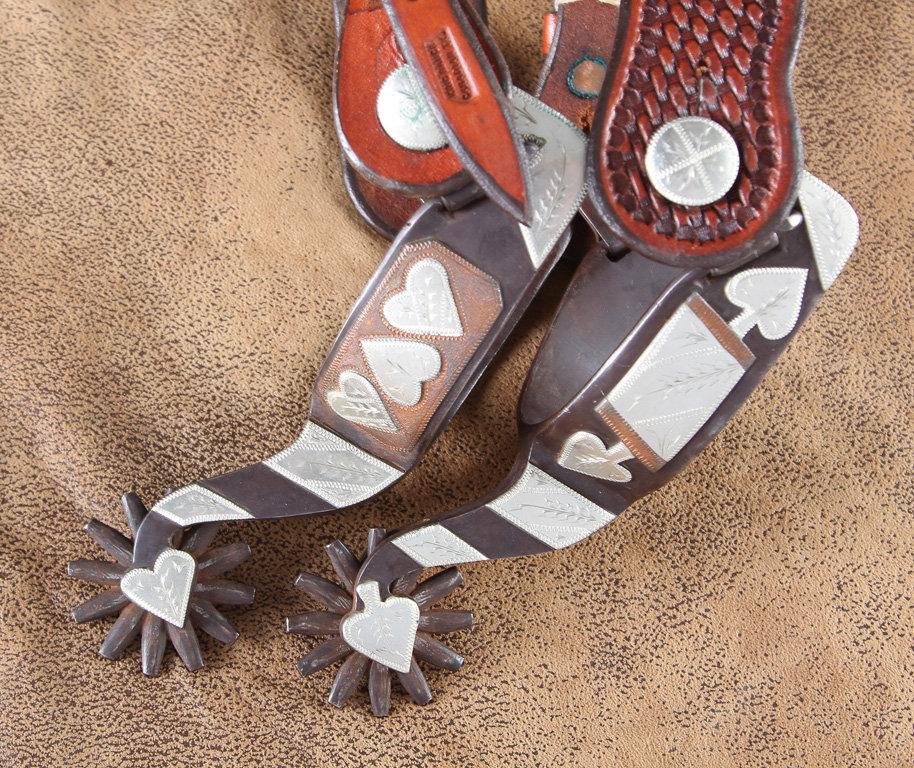 Fine pair of double mounted, hand engraved, sterling overlay Spurs by noted Texas Bit & Spur Maker W
