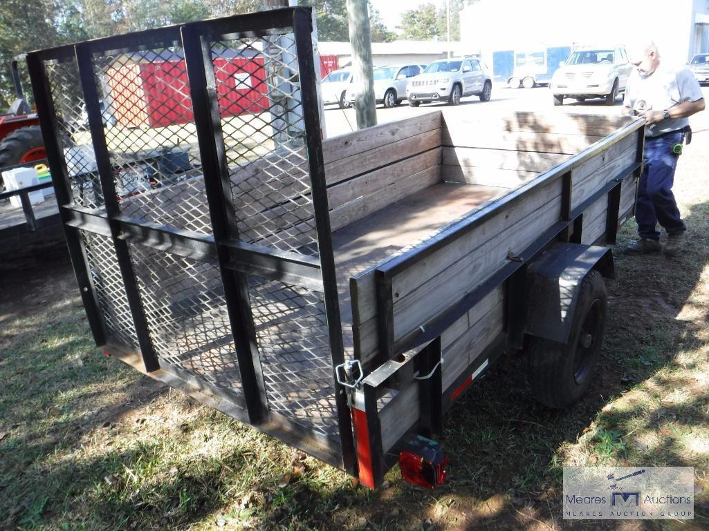 Single axle trailer with ramps and removable side panels