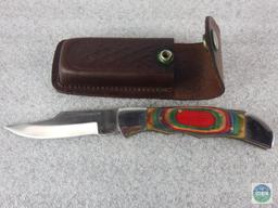Folding pocket knife with belt sheath