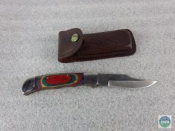 Folding pocket knife with belt sheath