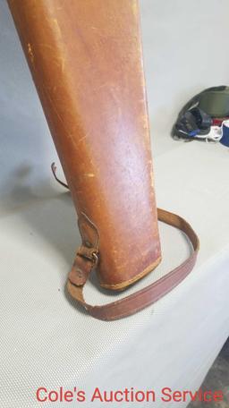 Antique leather hard-sided rifle scabbard in good condition. Measures approximately 34 in long.