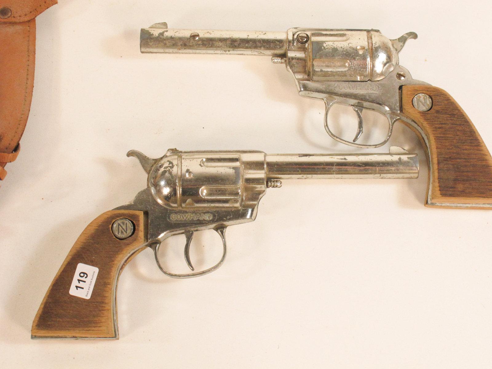 Pair of Cowhand Six Shooters