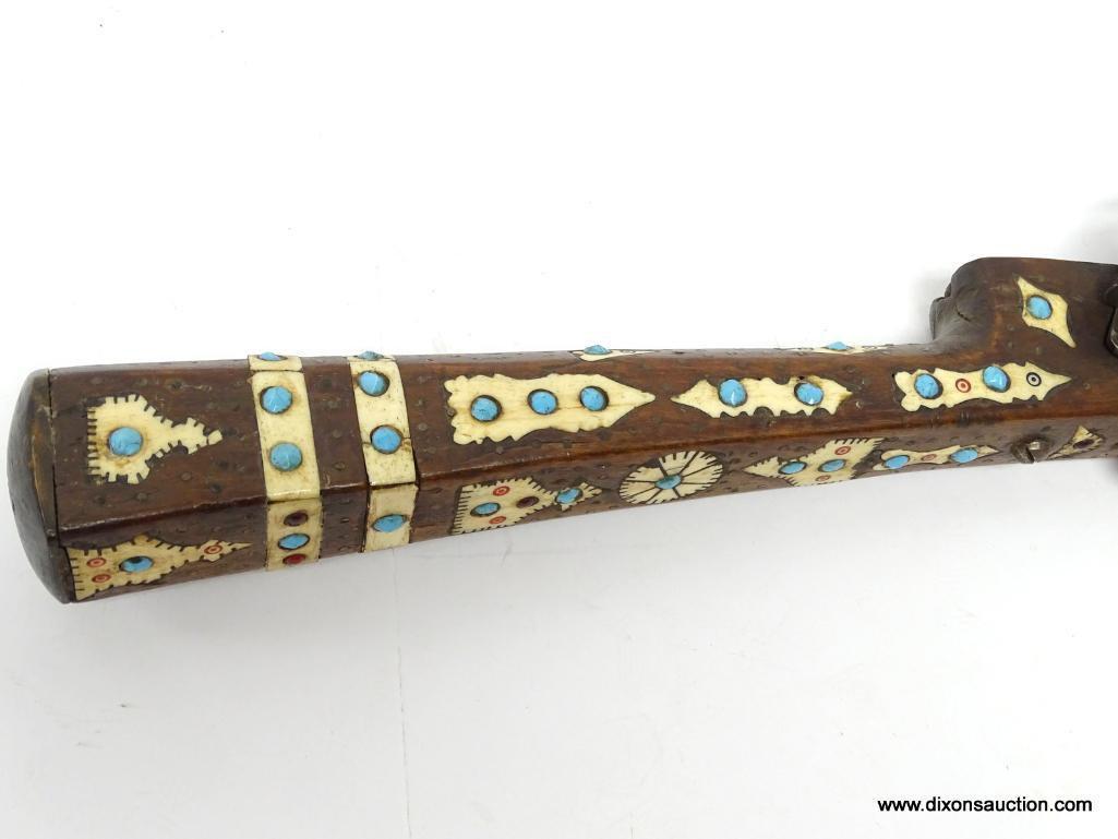 (SC) AFRICAN/ OTTOMAN EMPIRE FLINTLOCK TRAPPER'S RIFLE. STOCK IS INLAID WITH IVORY AND SET WITH RUBY