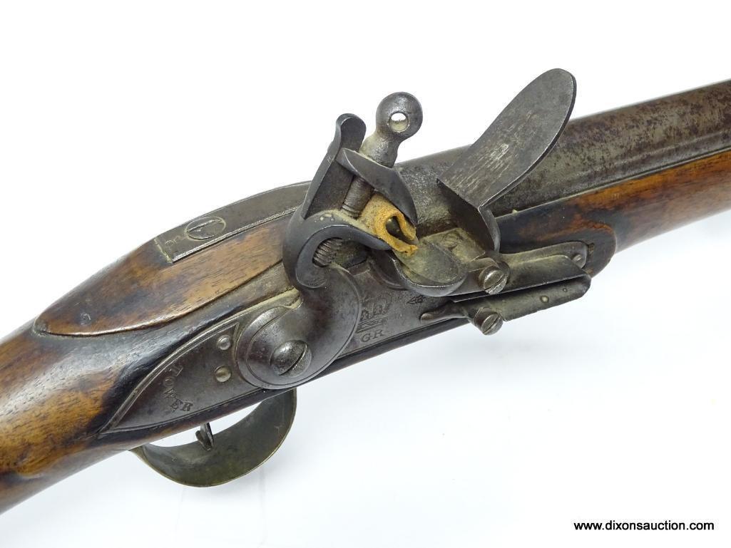 (SC) TOWER FLINTLOCK RIFLE. 55" LONG. .76 CAL. CROWN MARK & GR ON THE BREECH PLATE IN FRONT OF THE