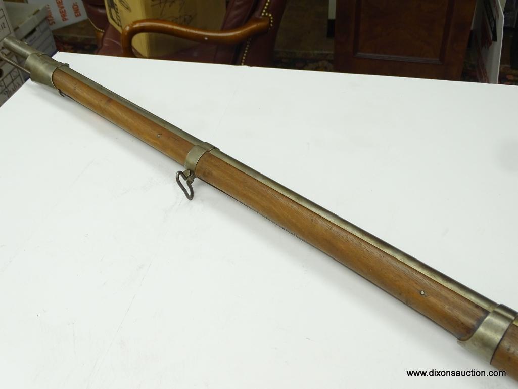 (SC) FLINTLOCK RIFLE WITH RAMROD. 57" LONG. MARKED: U.S. AND D. NIPPES PHILA. MARKED ON THE LEFT