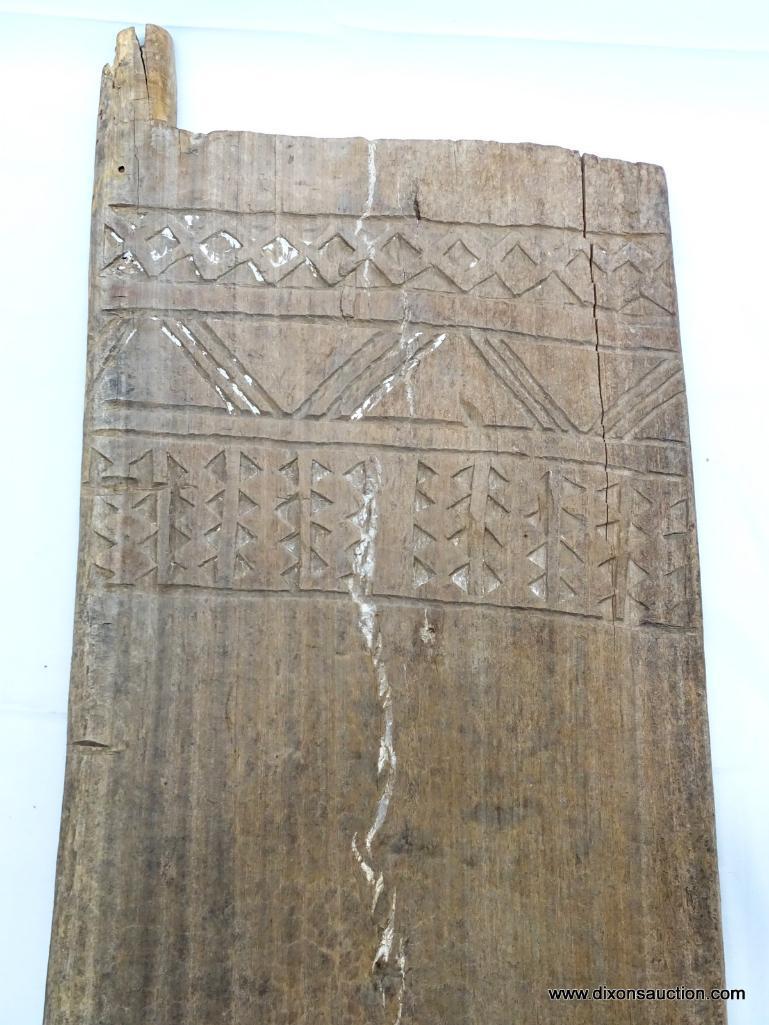 DOOR, BATONGA DOOR WITH TRIBAL CARVINGS, APPROXIMATELY 56.5? H, MID 20TH CENTURY, ESTIMATED VALUE