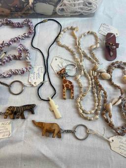 Lot of jewelry and keychains, many marked from Kenya - zebras, elephants, miniature African drums