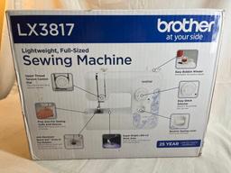 Like new in box Brother 17-stitch Sewing Machine LX3817 and sewing accessories.