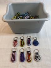 Large lot of hand made beaded keychains
