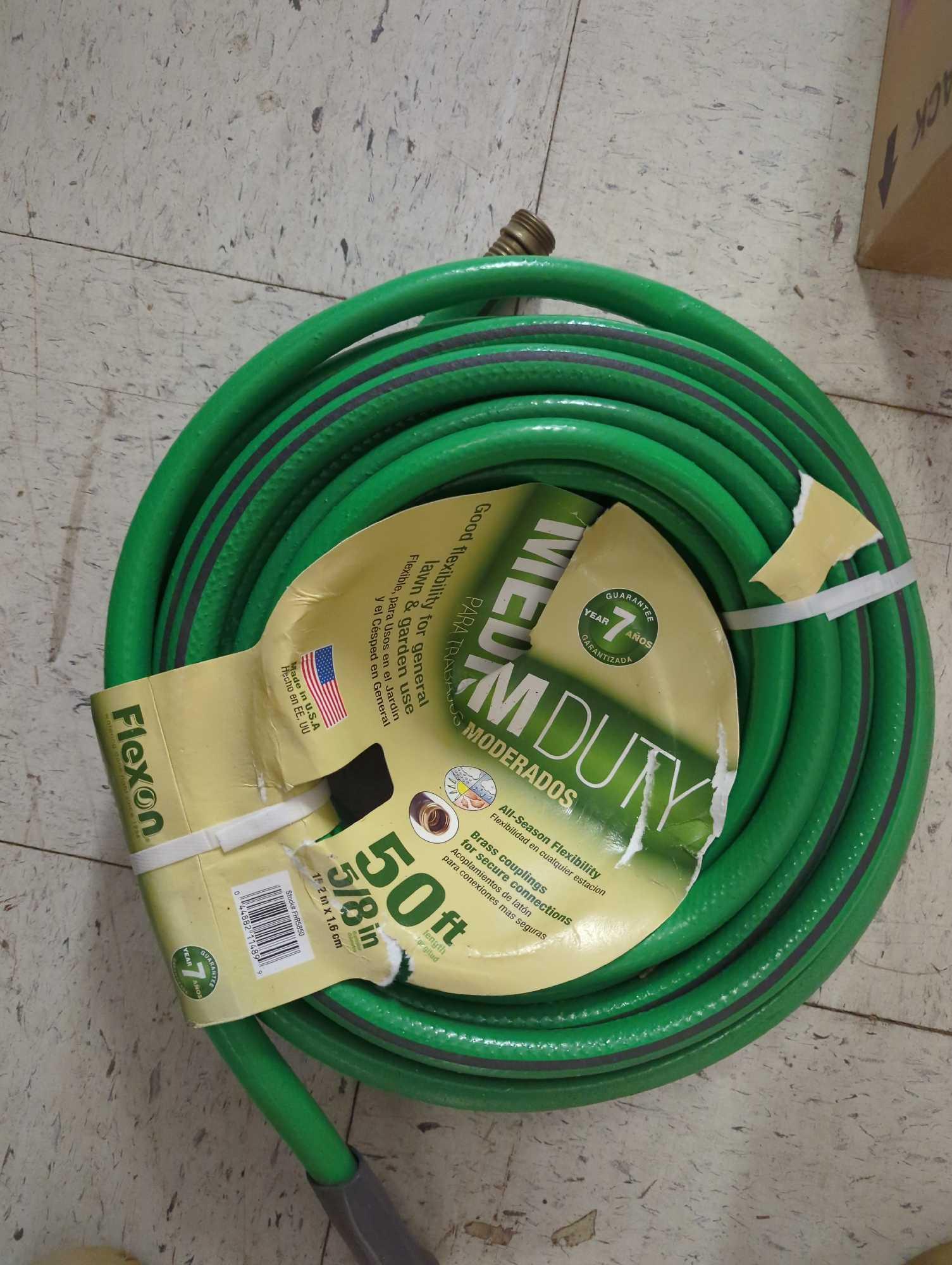 Shop lot of assorted items to include, Box of five 55-ft green outdoor extension cord, flexon median