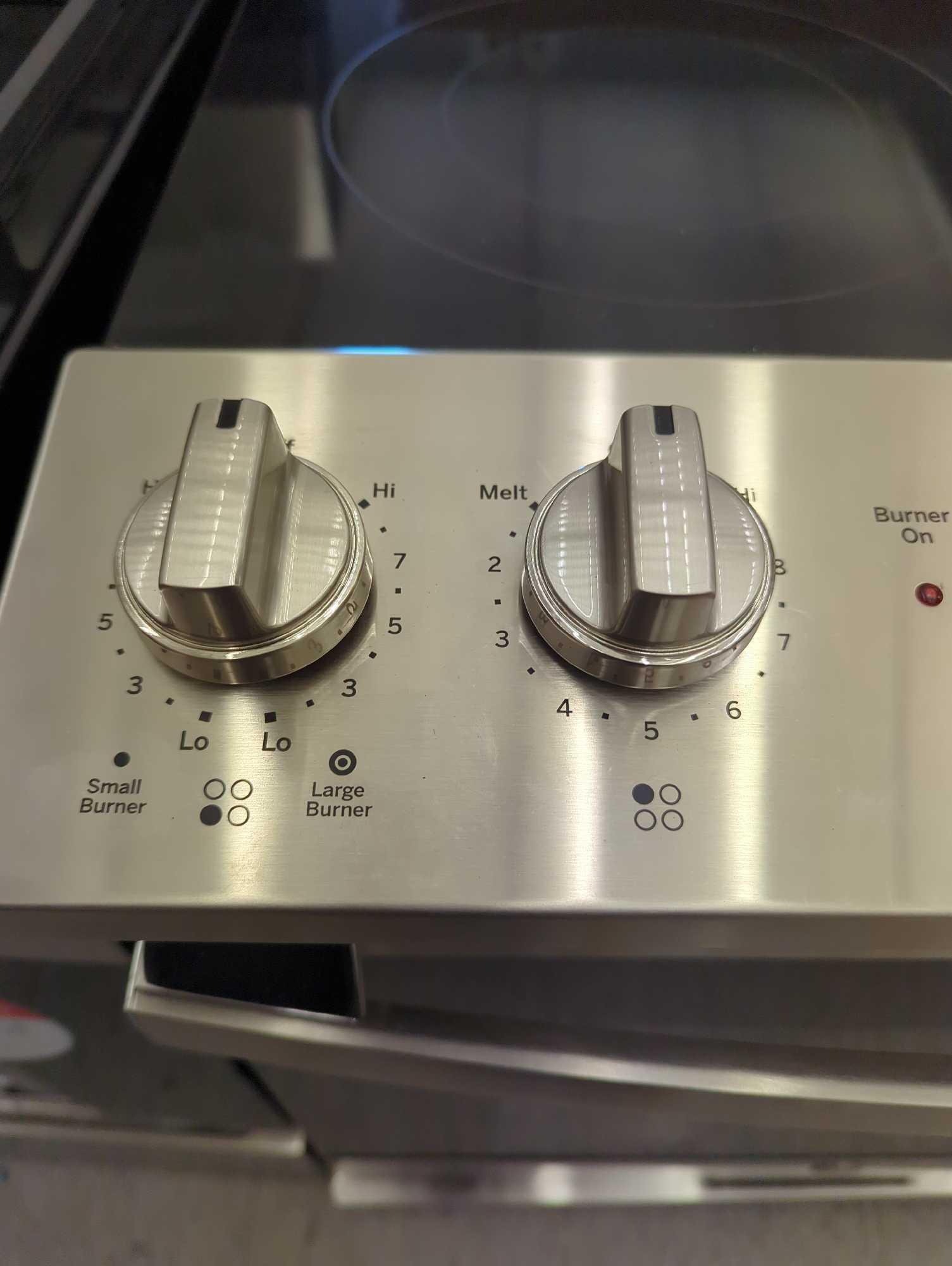(Has Some Minor Denting) GE 30 in. 5 Element Slide-In Electric Range in Stainless Steel with Crisp