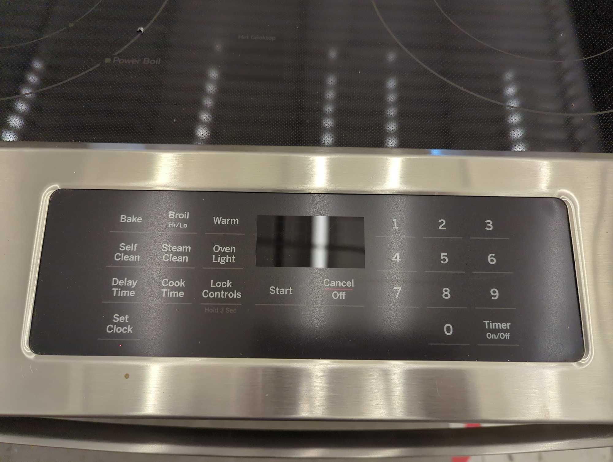 (Has Some Minor Denting) GE 30 in. 5 Element Slide-In Electric Range in Stainless Steel with Crisp