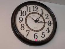 (LR) STERLING AND NOBLE CLOCK COMPANY ROUND BATTERY OPERATED WALL CLOCK. MEASURES 18-1/2" DIA.