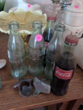 (LR) VINTAGE LOT TO INCLUDE A STARR WALL MOUNT BOTTLE OPENER, A COCACOLA WALL MOUNT BOTTLE OPENER,
