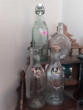 (LR) 4 PC. LOT TO INCLUDE A PAIR OF ABSOLUTE MILK GLASS MILK BOTTLES, TORAH GLASS BOTTLE WITH WHITE