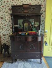 (FD)ANTIQUE OAK STAINED STEP BACK SIDE BOARD. SERPENTINE FRONT, FEATURES 3 (DR)AWERS, 2 DOORS, AND