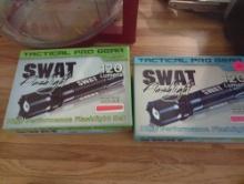 (KIT) LOT OF 2 ZOOM TACTICAL PRO GEAR SWAT FLASHLIGHTS, RETAIL PRICE $25/EACH, APPEARS TO BE USED,