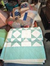 (BR1) LOT OF 2 HAND MADE QUILTS, 1 IS SCRAP PATCHWORK, THE OTHER US UNIFORM GREEN AND WHITE DIAMONDS