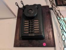 (BR2) VINTAGE WESTERN ELECTRIC TELEPHONE ON WOOD PLAQUE (MISSING THE PHONE). MEASURES 11-1/2"W X