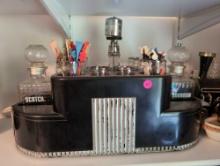 (BR2) VINTAGE BLACK/SILVER TONED HARD PLASTIC BAR CADDY WITH SCOTCH AND BOURBON DECANTERS,