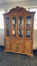 LIGHTED CHINA HUTCH WITH BEVELED GLASS