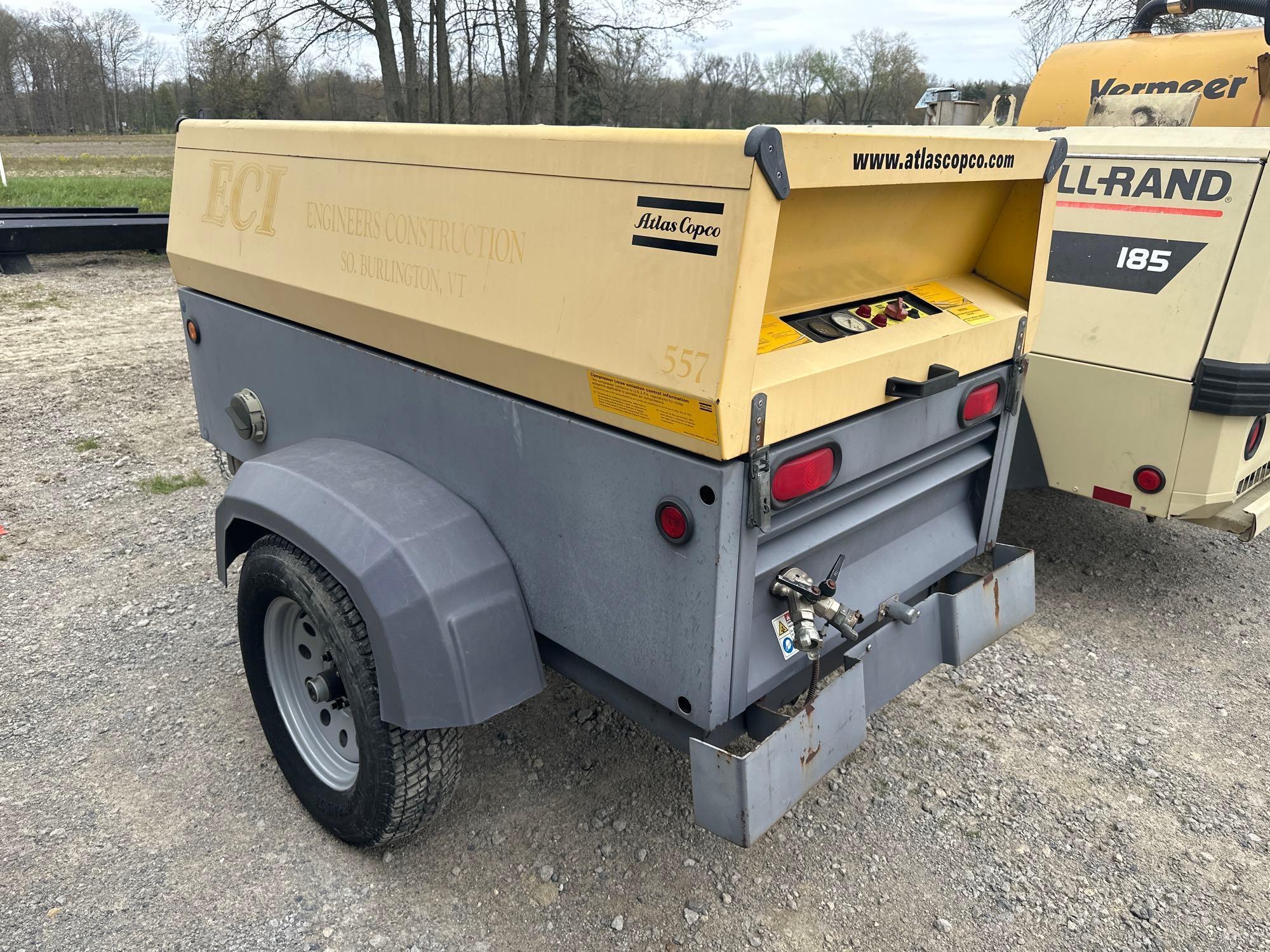 ATLASCOPCO 185 AIR COMPRESSOR powered by John Deere diesel engine, equipped with 185CFM, trailer