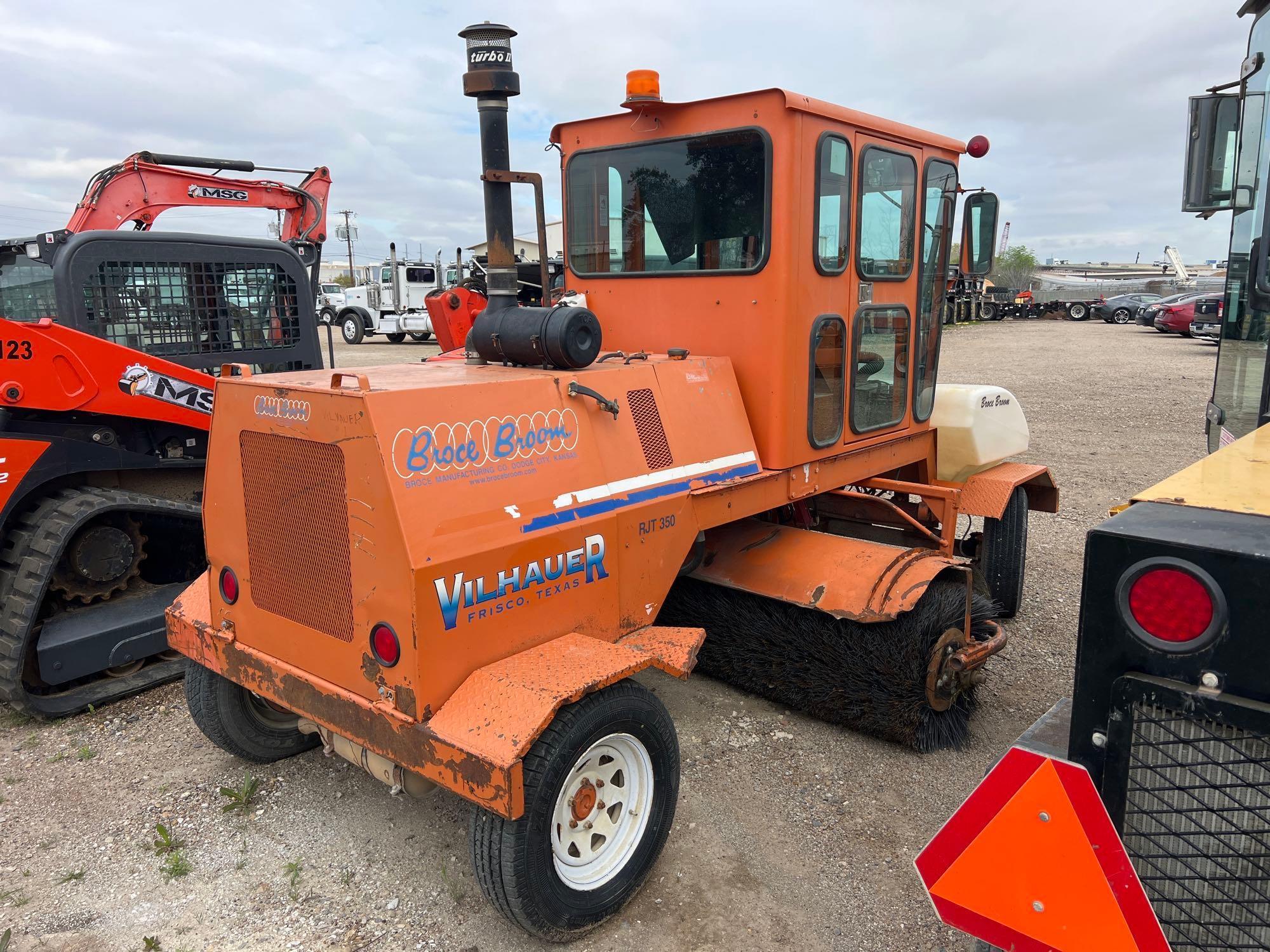 BROCE RJT350 SWEEPER SN:406738...powered by diesel engine, equipped with EROPS, air, heat, 8ft. broo