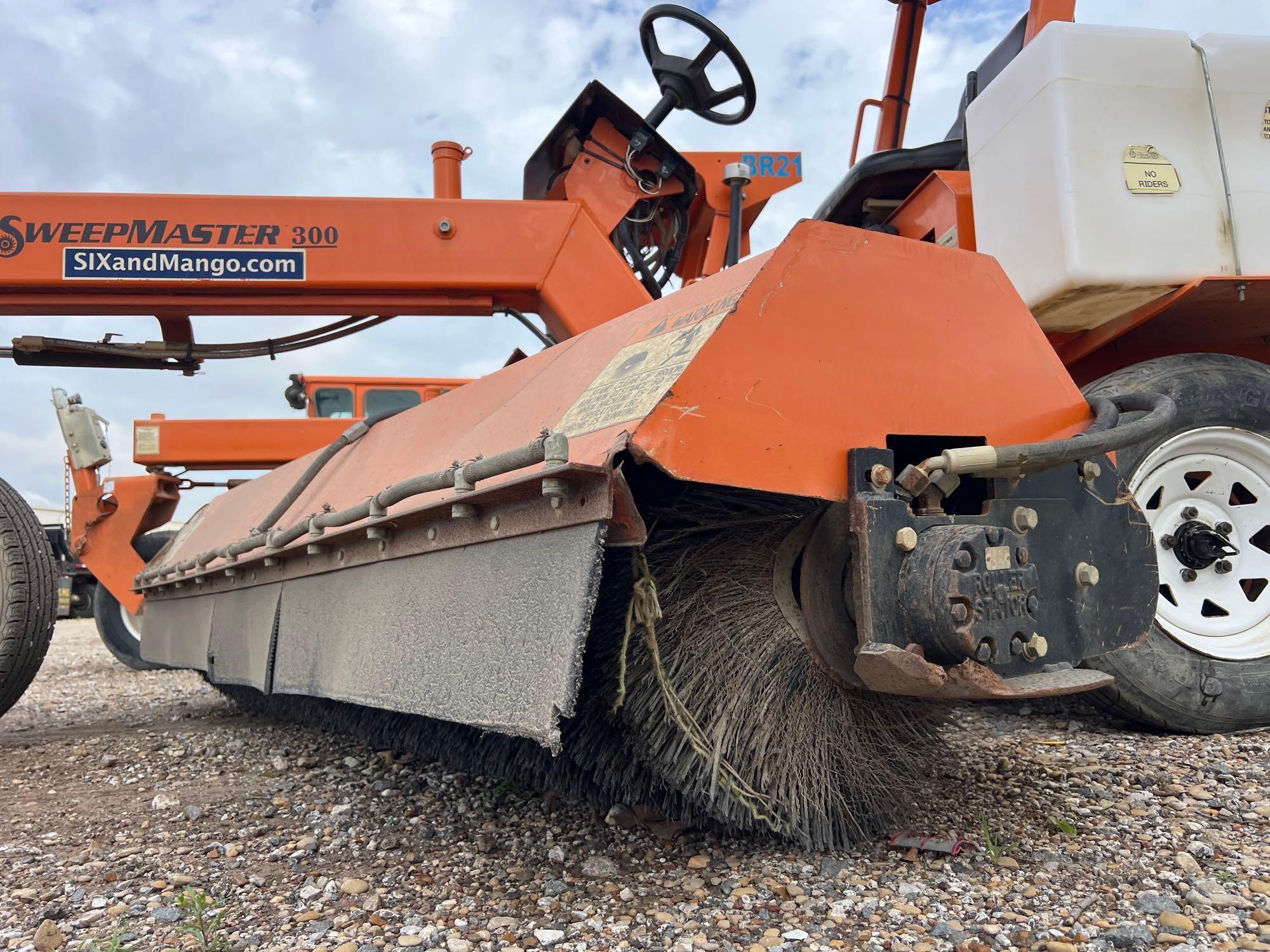 LAYMOR SM300 SWEEPER SN:35730 powered by Kubota V1505 dieael engine, equipped with OROPS, 8ft.