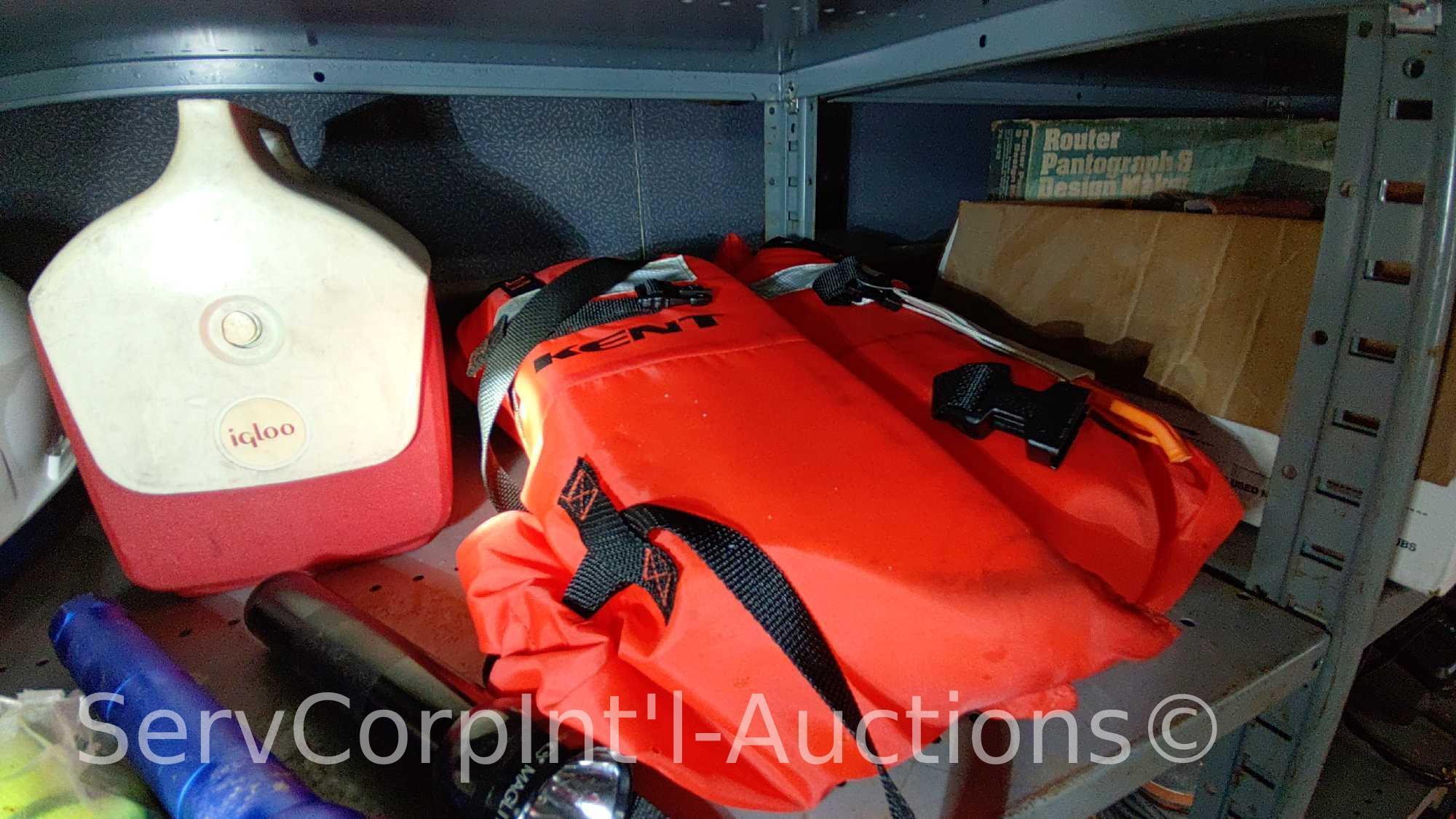 Lot on 2 Shelves of Hard Hats, Small Ice Chest, Life Jacket, Water Pump/Timing Kit (Unknown