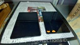Lot on 2 Shelves Various i-Pad's & Nexus Tablets (may be locked and/or have cracked screens), Signed