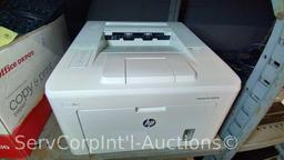 Lot on 3 Shelves of Dell 2230d Printer, HP LaserJet Pro M203dw Printer, Dell 1720 Printer, Netgear