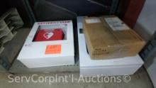 Lot on Shelf of 2 Phillip Heart Starty FR2 AED in Metal Cabinets (Seller: City of Slidell)